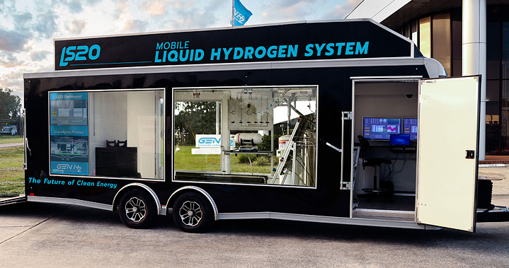 Mobile liquid hydrogen system trailer with its side door open, showing the equipment inside